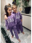 Спортивний костюм з принтом на дівчинку